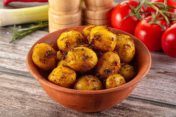 Baked small baby potato with herbs