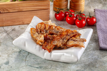 Fried crispy pork bacon snack