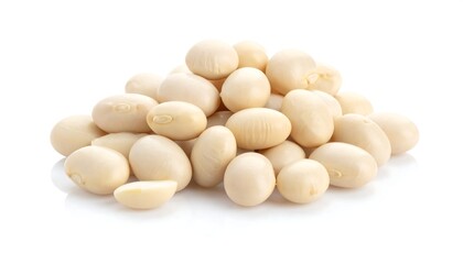 Pile of ivory-colored soybeans, some with dimples, isolated on white background. Close-up shot, smooth texture