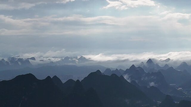 Educational Documentary: Sunshower Weather Phenomenon Over Mountain City with Golden Light