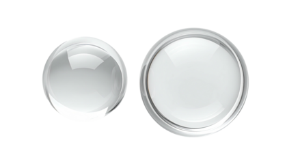 Two white glass-like buttons, one circular, one dome-shaped