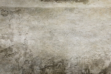 Aged grunge concrete plastered wall.