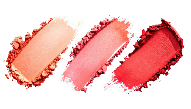 Three coral-hued powder swatches isolated on a black background