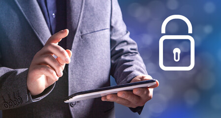 Businessman and lock icon on virtual screen, concept of privacy