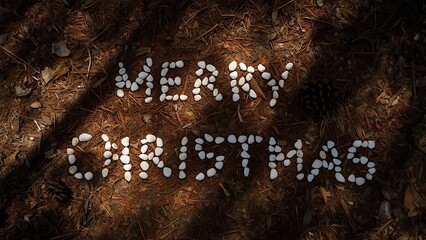 Merry Christmas message spelled out in stones on pine needles, Holiday greetings on forest floor made with rocks, Festive Christmas wishes in nature setting using pebbles and pine needles