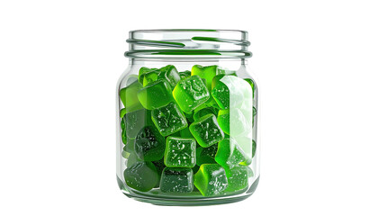 Glass jar is filled with square green gelatinous treats