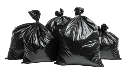 Group of five glossy black tied plastic garbage bags