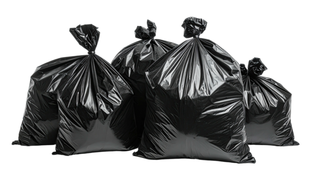 Group of five glossy black tied plastic garbage bags