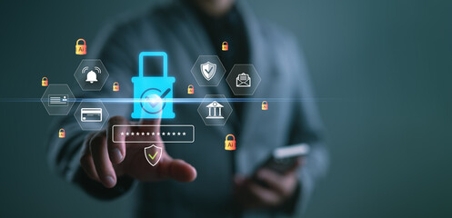 Cybersecurity concept with a businessman touching virtual screen with password protection, data encryption, secure login, and digital lock icon. Online data safety and privacy technology.