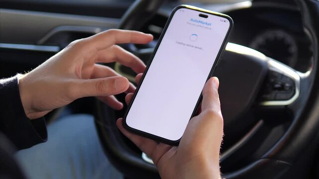 This video follows the key moment of discovery in the online shopping journey: a consumers hand selects a promising listing on a mobile device, unveiling a comprehensive ad for a second hand car.