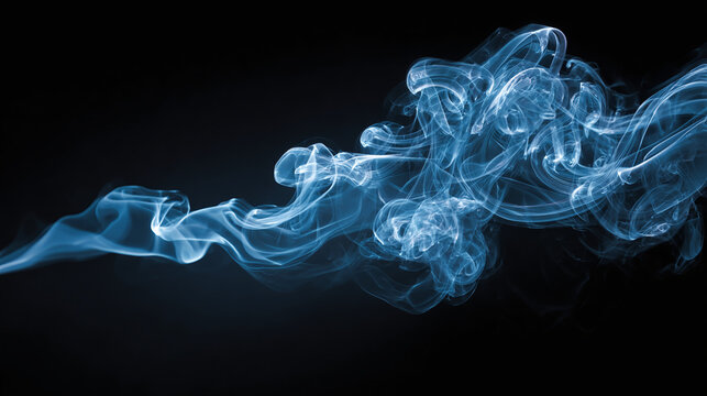 Mysterious blue smoke gracefully swirls against a dark background, creating an ethereal and abstract visual effect
