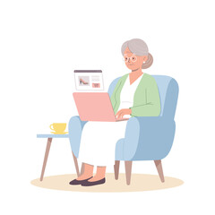 Elderly woman shopping online with laptop while sitting in armchair  