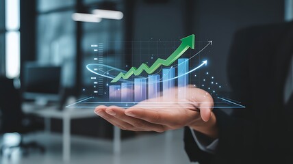 Close up of a person s hand holding a glowing futuristic holographic projection of a rising stock market graph and financial data