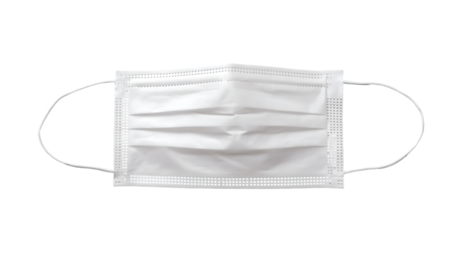 A single white surgical face mask with ear loops isolated against a black background in a studio shot