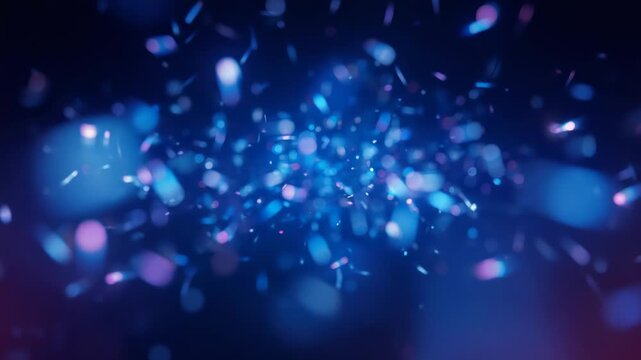 Materializing glowing blue and pink particles clustering inward and expanding outward in dark void