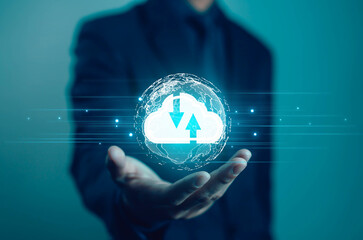 Businessman holding digital cloud with upload and download icons, concept of cloud computing, data transfer, storage, and cybersecurity for digital transformation and modern business technology.