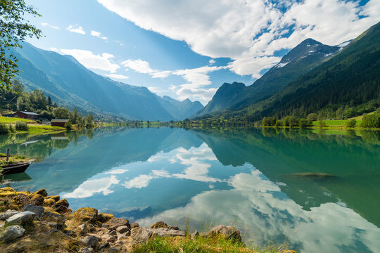 Scenic mountain lake reflection in Floen Olden national park Norway
