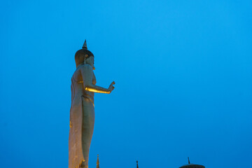 Buddha statue on the mountain in the evening at public park on mountain peak of Hat Yai, Songkhla Province, Thailand