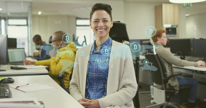 Smiling analyst wearing plaid shirt, cardigan using world map with Bitcoin icons at office - Powered by Adobe