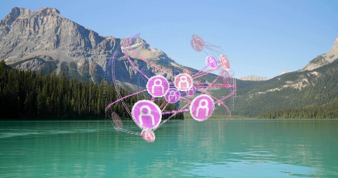 Fototapeta Floating digital network overlay hovering above mountain lake, with pink user icons and link lines