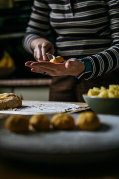 Making pumpkin gnocchi by hand