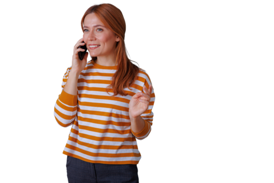 Woman talking on phone, smiling and communicating, redhead female having a positive conversation