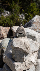 balanced small stones in mountains nature background