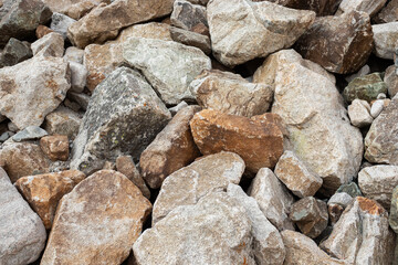Natural white and orange stone texture background material with rough earthy surface
