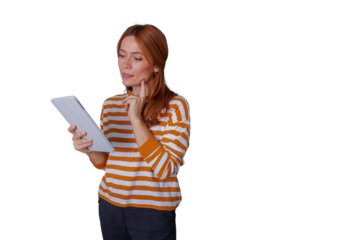 Woman holding tablet and thinking, contemplating digital content, redhead reflecting on information, transparent background