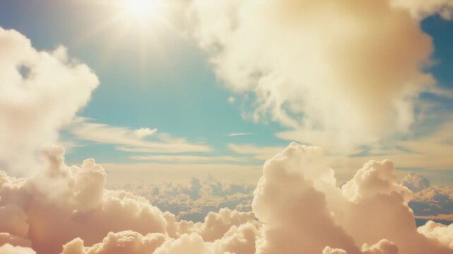 Panning camera over sunlit high-altitude cumulus after sunburst, revealing clear turquoise sky