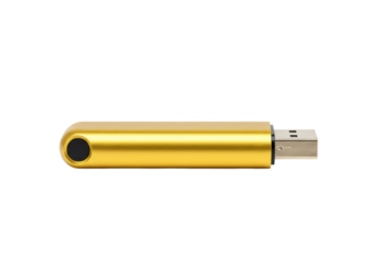 Isolated sleek golden USB flash drive used for data storage and file transfer on a table