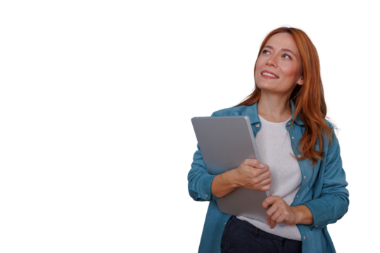 Woman holding laptop looking up, smiling, finding inspiration for business ideas, transparent background