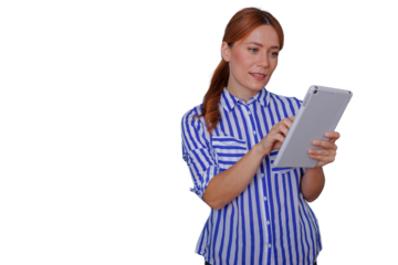 Professional woman using digital tablet, redhead employee busy with technology device, researching, working
