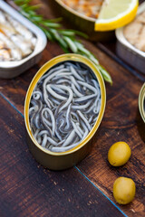 Canister of canned mussels