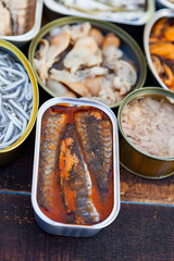 Assortment of open tin cans