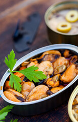 Canister of canned mussels