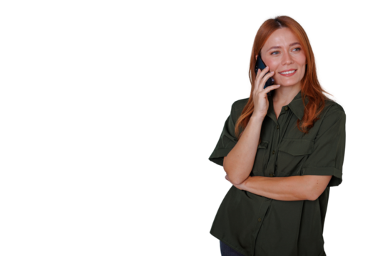 Young redhead woman communicating on phone, smiling and looking away with copy space, transparent background