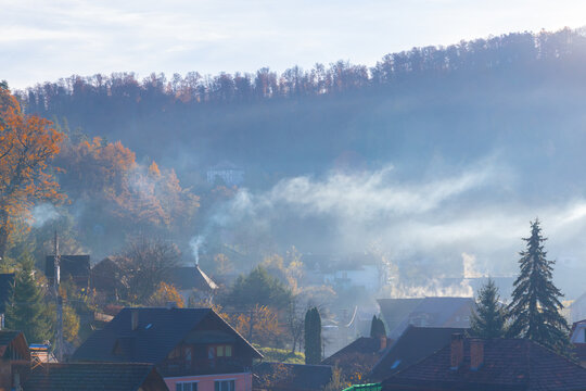 Misty morning in a mountain village seen from above