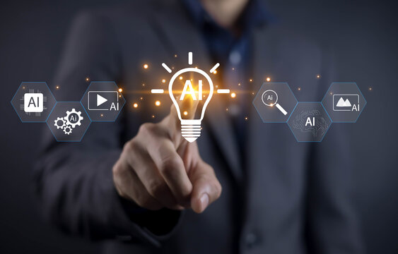 Businessman touching glowing AI light bulb hologram with futuristic icons, symbolizing artificial intelligence, innovation, automation, and technology in modern business and digital transformation.