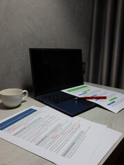 proofreading paperwork on table