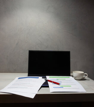 proofreading paperwork on table