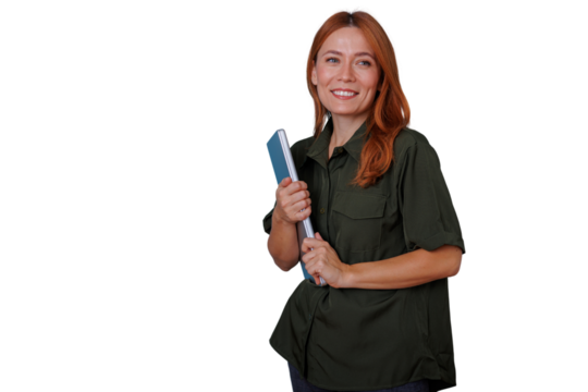 Redhead woman smiling, holding books, looking away, student or teacher concept with copy space
