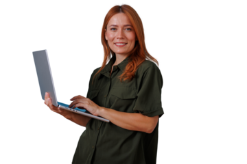 Redhead woman smiling, using a laptop, showing expertise and professionalism. Image with transparent background