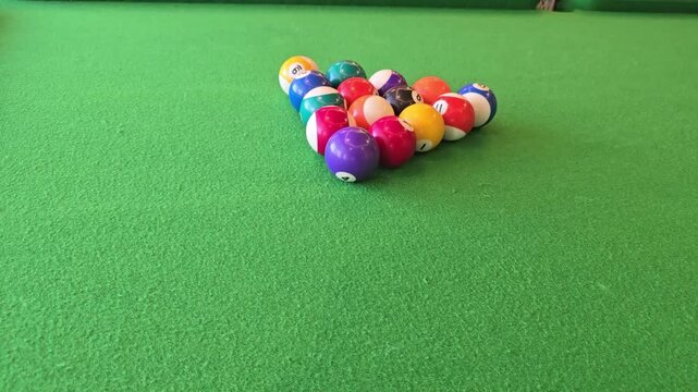billiard balls on green background