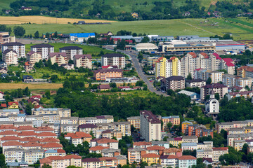 Fototapeta premium panoramic view from above on the street of city Piatra Neamt, Romania, city architecture, urban landscape