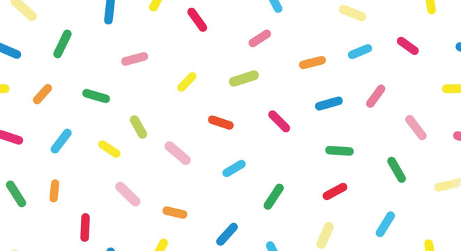 Scattered multicolored sprinkles, bright, simple, confectionery, on white backdrop