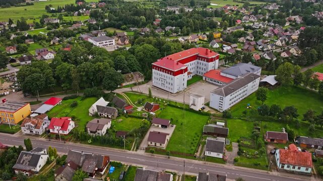 Drone moves toward Skaudvile Gymnasium in Taurage District Lithuania