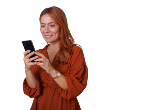 Happy young woman smiling, holding smartphone, checking social media or messaging, transparent background