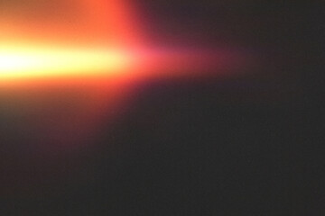 light leak overlay effect with scratch dust and blur orange light leaks,retro noisy film texture light leak flare on black background,abstract background with colorful light,grunge old film burn