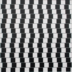 Classic black and white café wall optical illusion featuring a checkerboard pattern that makes parallel lines appear slanted. Striking visual illusion demonstrates how contrasting tones.